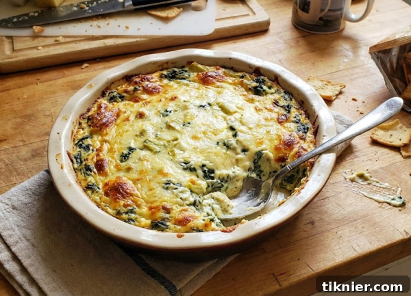 Creamy Spinach Artichoke Dip with Smoked Provolone