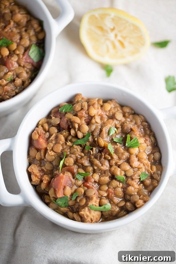 Slow Cooker Moroccan Lentil Soup, a healthy and comforting vegetarian recipe, perfect for meal prepping.